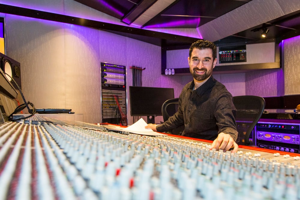 Marc Jovani at the mixing console in a professional recording studio