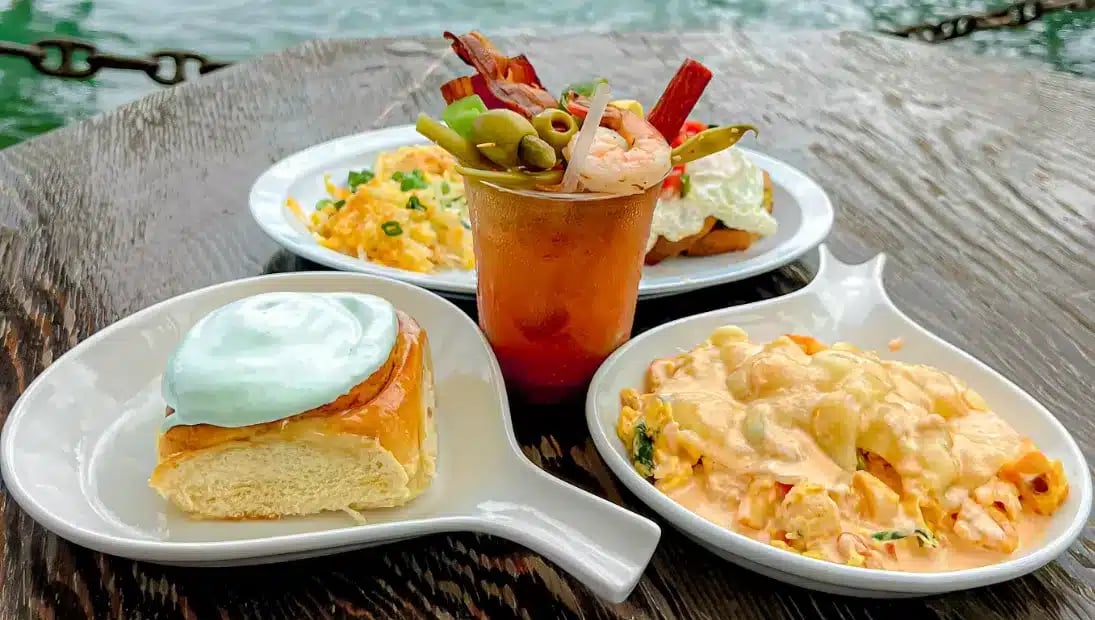 Loaded Bloody Mary and breakfast plates on the waterfront deck at the Hungry Tarpon Restaurant