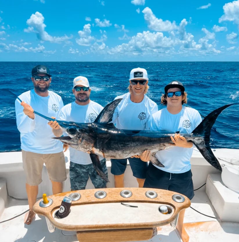 Swordfish brought aboard a charter boat