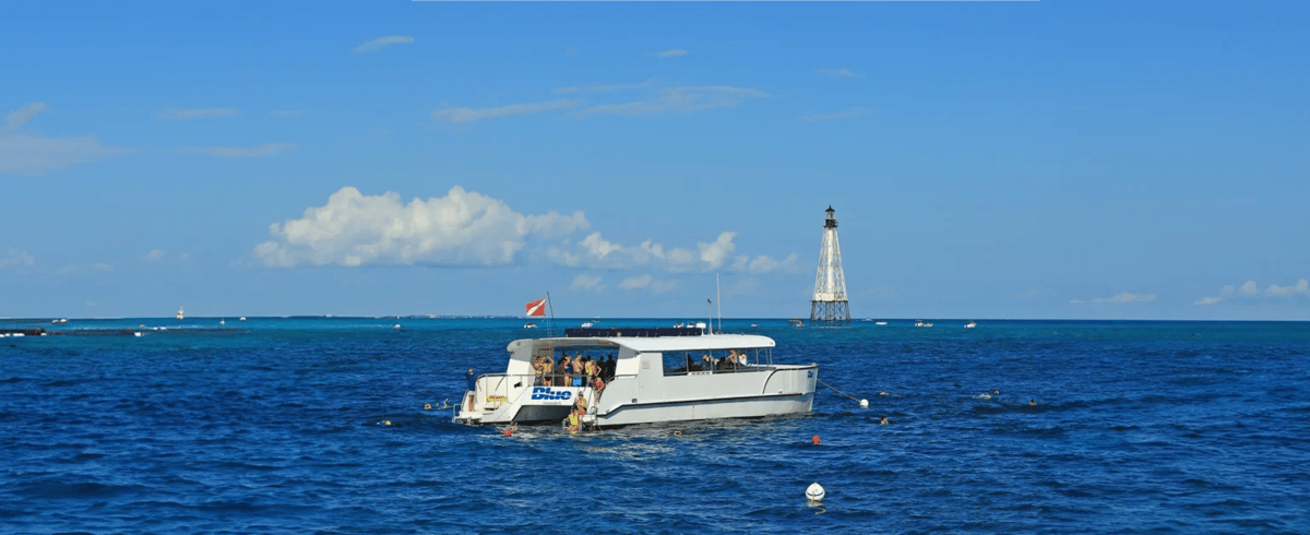 The Blue catamaran anchored at the reef off Islamorada on a snorkel trip