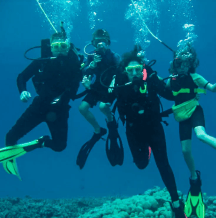 Guided snuba divers exploring a reef in the Florida Keys