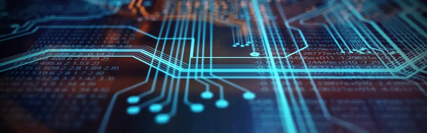 Close-up of a futuristic, glowing blue circuit board with intricate patterns and lines.