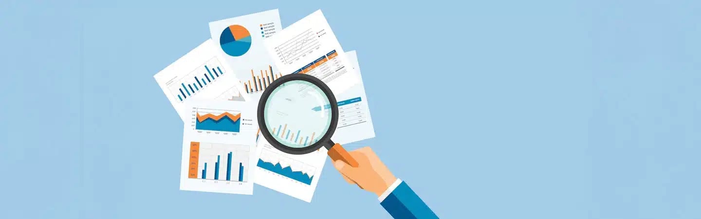 Illustration of a hand holding a magnifying glass over various financial documents and charts on a light blue background.