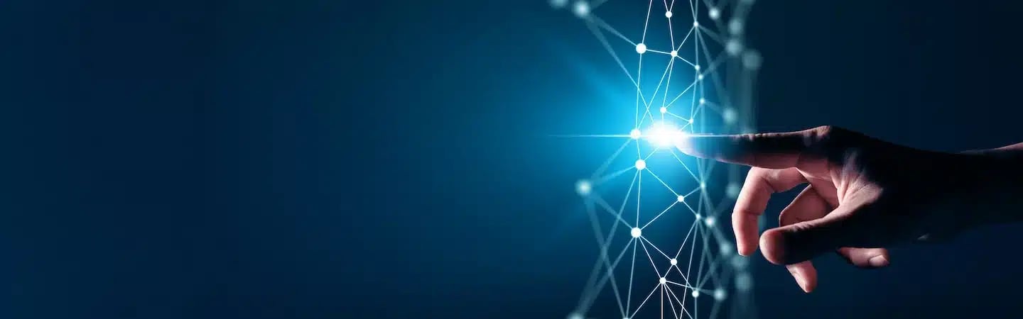 A hand touching a digital, glowing network of interconnected nodes against a dark blue background.