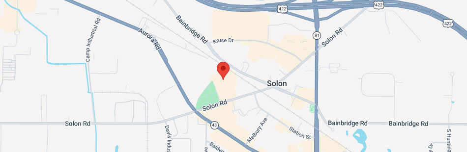Map showing the city of Solon, Ohio, with a red location pin. Major roads visible include Solon Rd, Bainbridge Rd, Aurora Rd, and Highway 422. Nearby streets and a green area are also shown, highlighting the region’s proximity to several renowned Ohio private colleges.