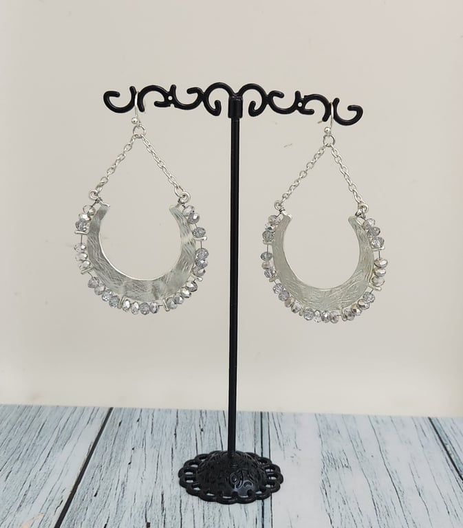 Hajmaal — clear crystal and silvertone semi circle earring (Size One Size, New without tags)