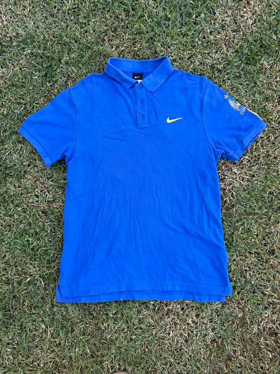 Nike — Nike Blue Polo "Yellow Swoosh" (Size L, Like new)