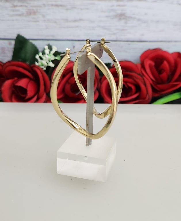 Hajmaal — goldtone twisted hoop earrings (Size One Size, New without tags)