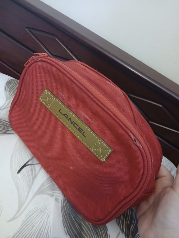 Lancel — Lancel Red Canvas Toiletry Bag (Size One Size, Fair)