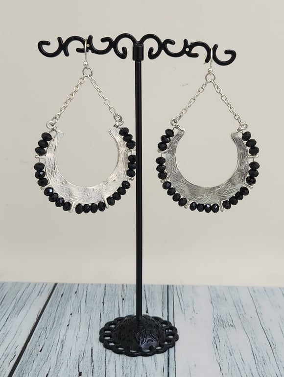 Hajmaal — black crystal and silver tone semi circle earring. (Size One Size, New without tags)