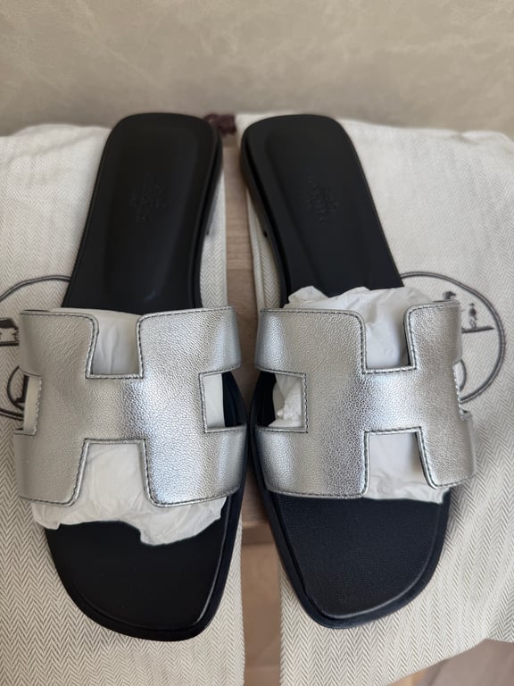 Hermès — Hermès Oran Sandals Silver (Size EU 38, New with tags)