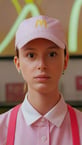 pastel pink mcdonald's worker, contrast light, white background, mcdonald's logo