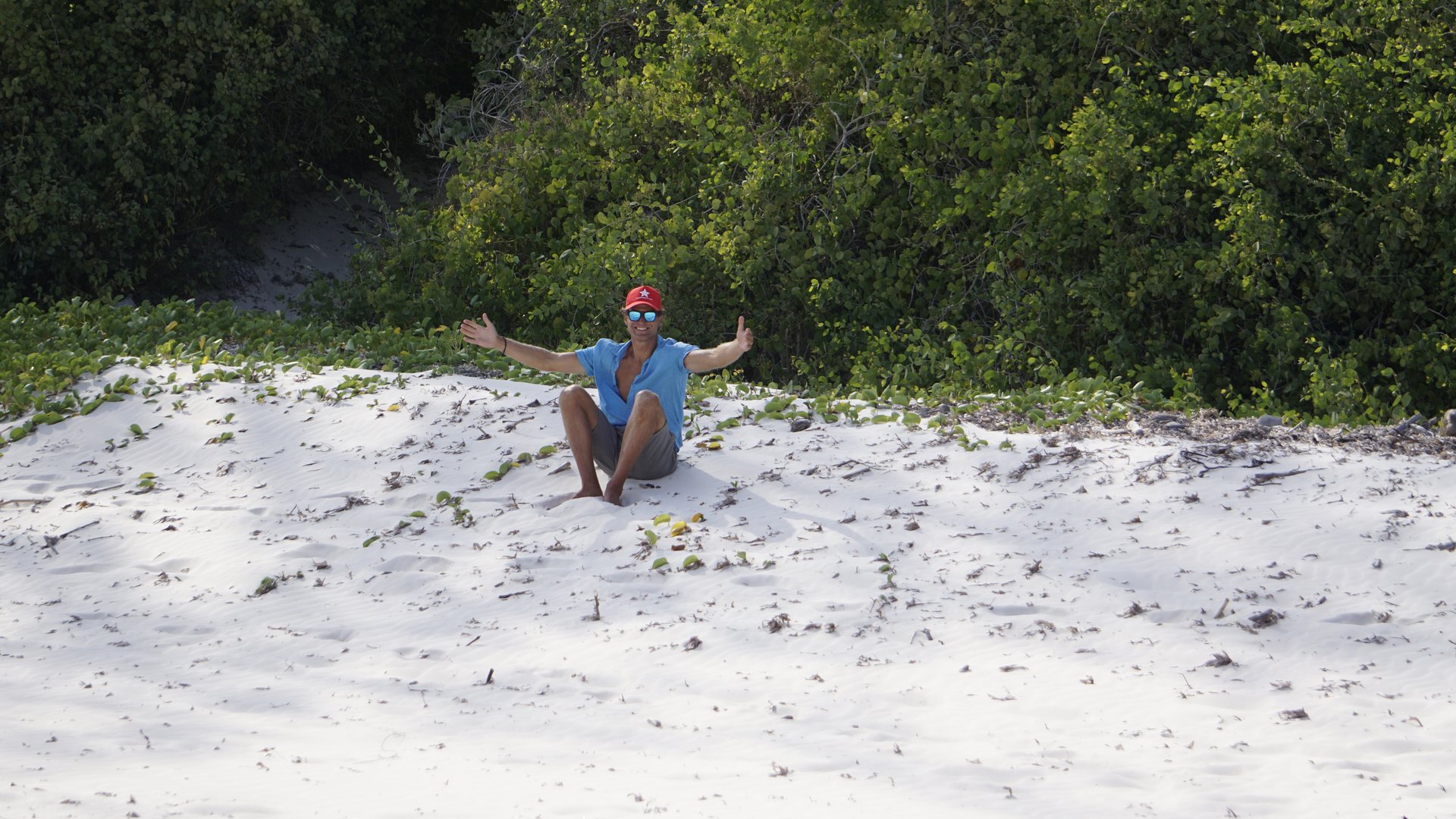 Michael Brill sitting in the sand at Watamu Beach Kenya - not kitesurfing.