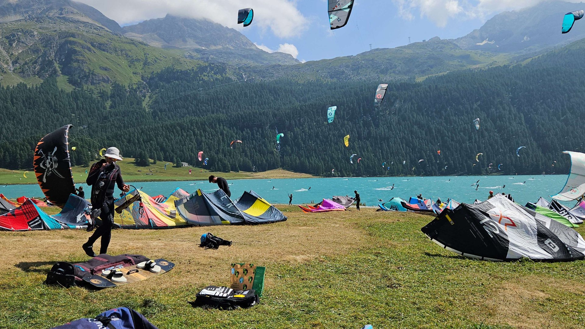 Sky full of colorful kites at lake Silvaplana