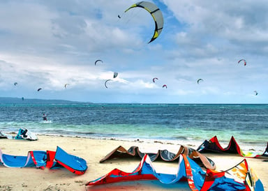 Many kites lying in the sand of Palawan