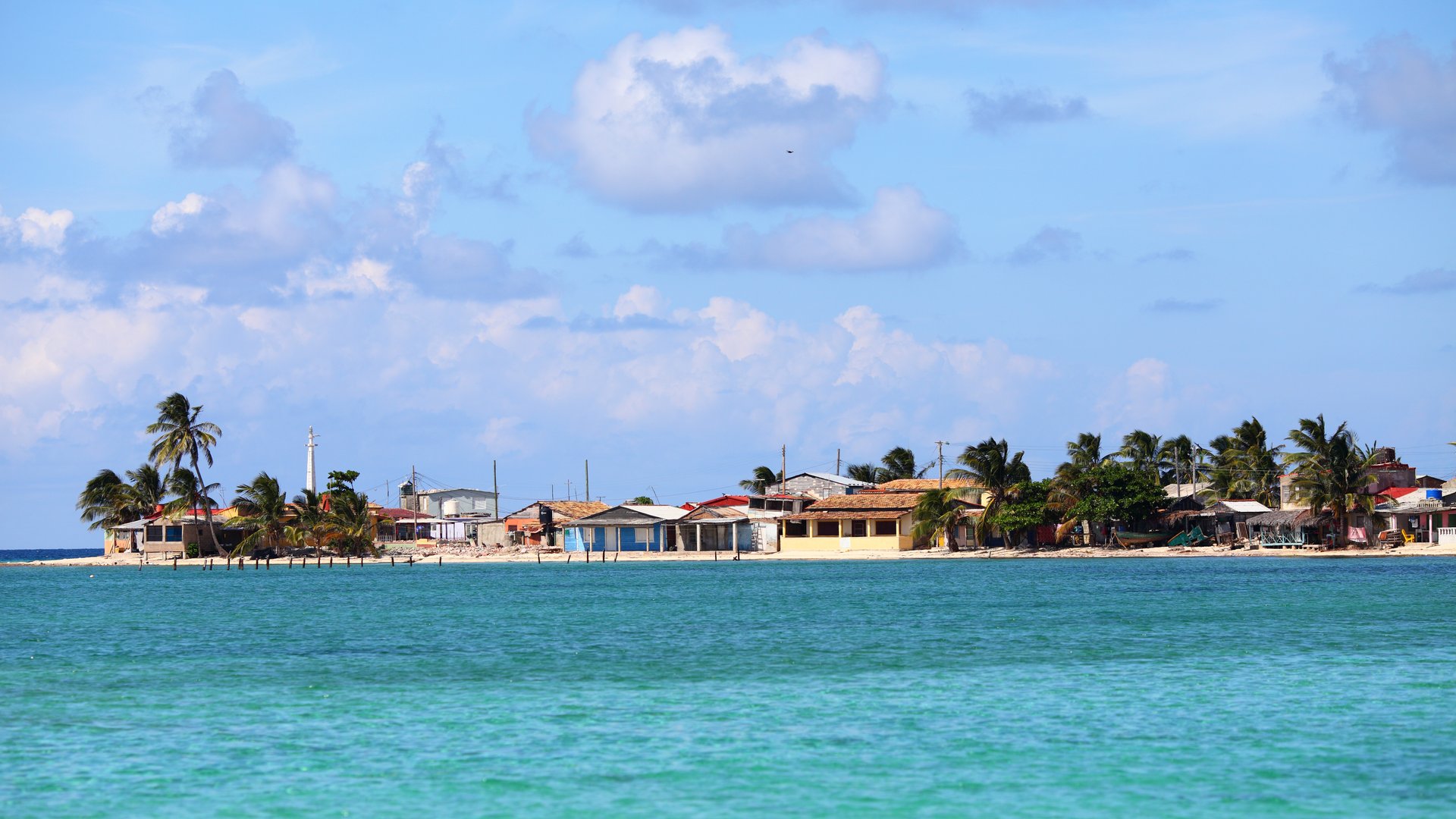 Santa Lucia from Boat with carribean Village