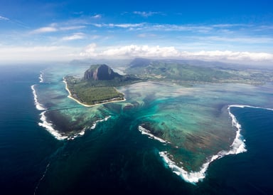 Flight shot over Le Morne with view of the island