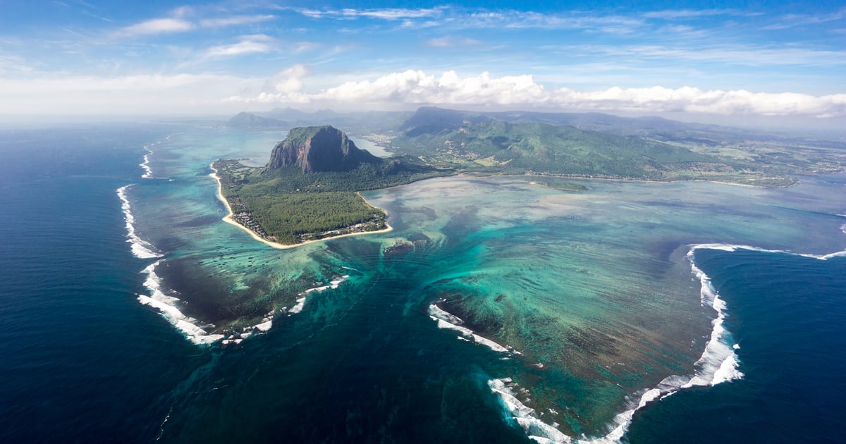 Flight shot over Le Morne with view of the island