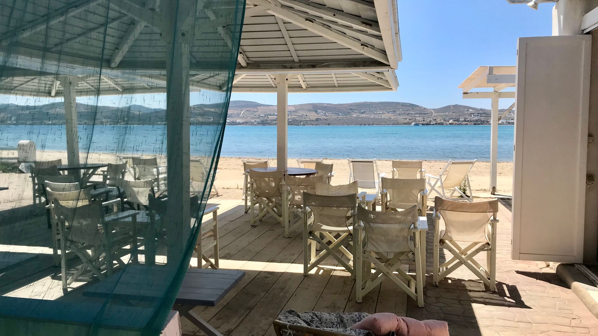 Paralia Pounta Kiteboarding in Kos view from the small but cute bar with tables, chairs heading the sea