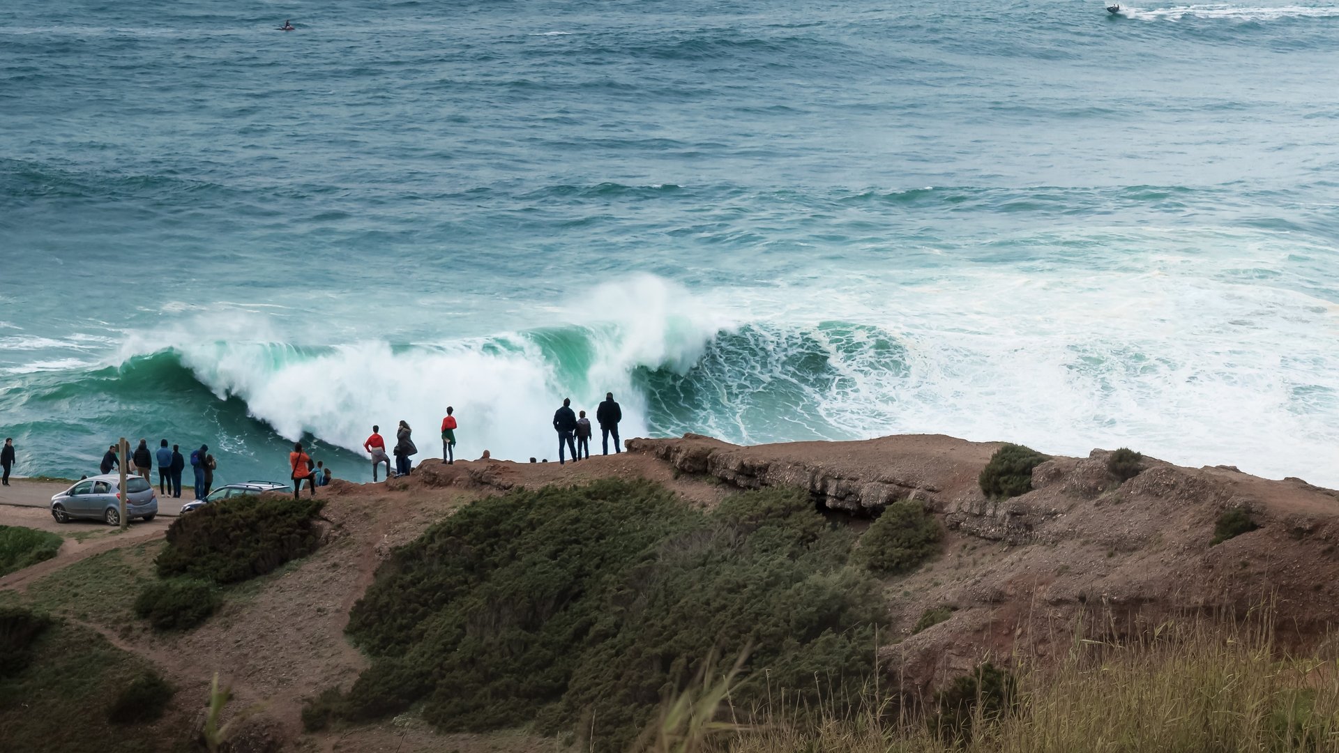 People watching the big waves in Nazare
