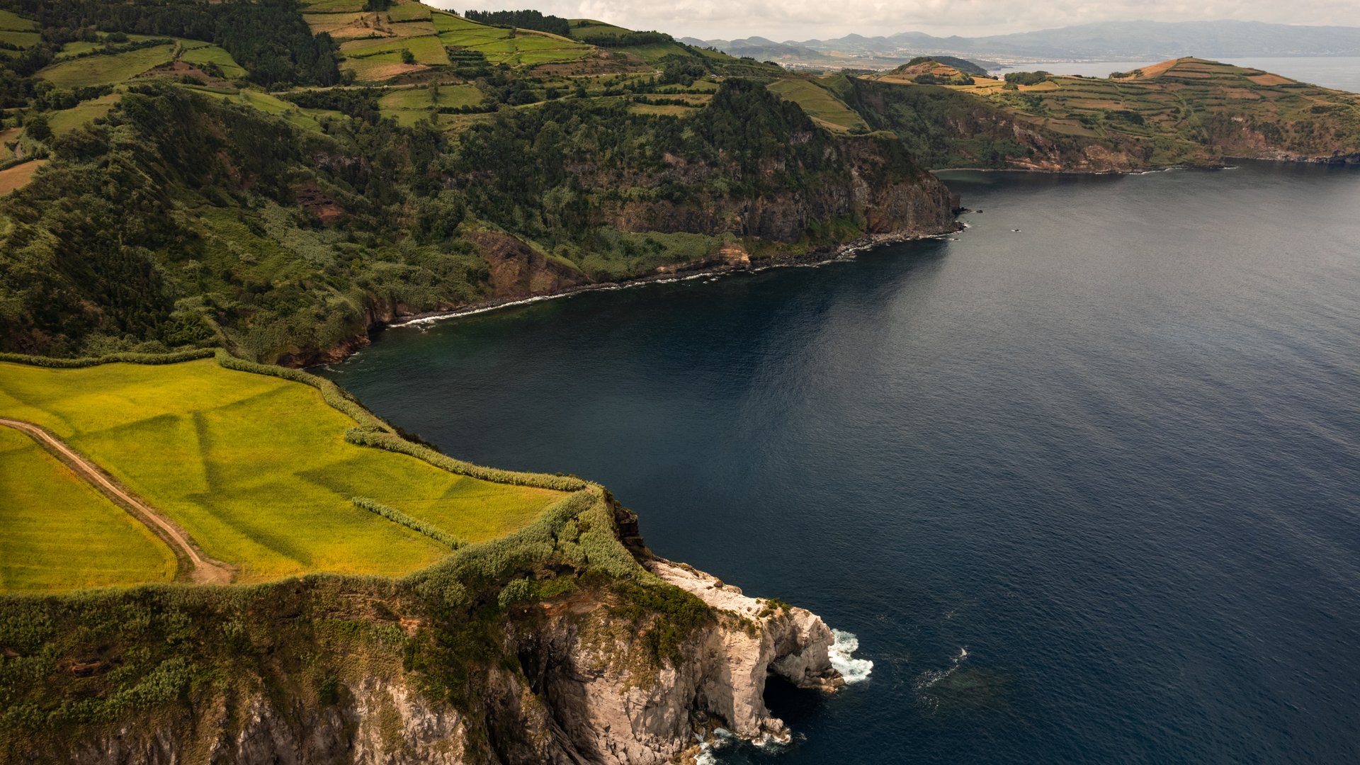 Picturesque coastline landscape with green hills in Azores