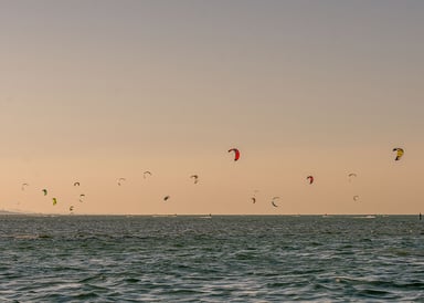 Kitesurfers in the water in Portugal Moledo