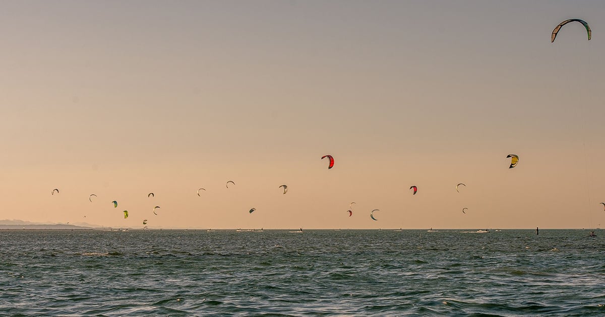 Kitesurfers in the water in Portugal Moledo