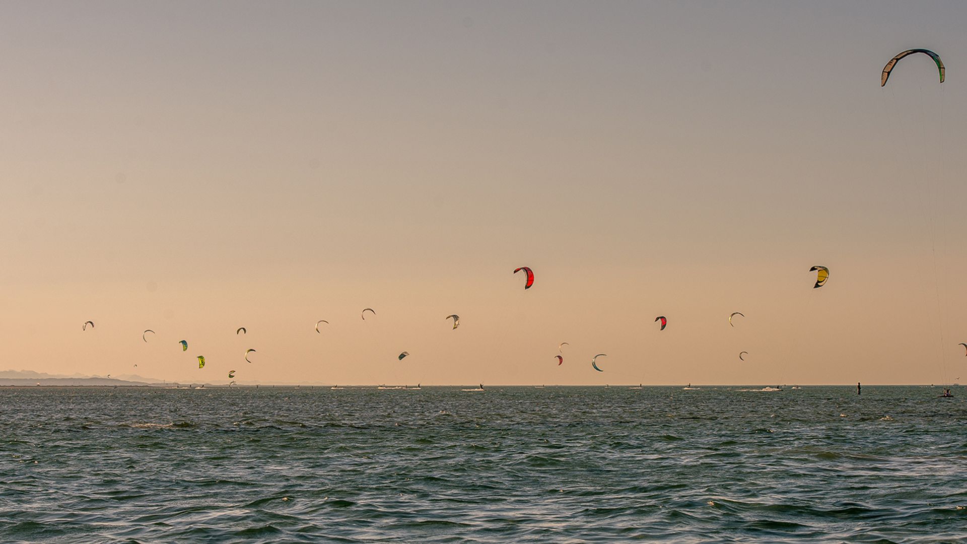 Kitesurfers in the water in Portugal Moledo