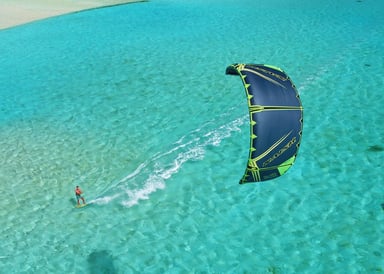 Kitesurfer enjoying beautiful turquoise water at Punta Rasa