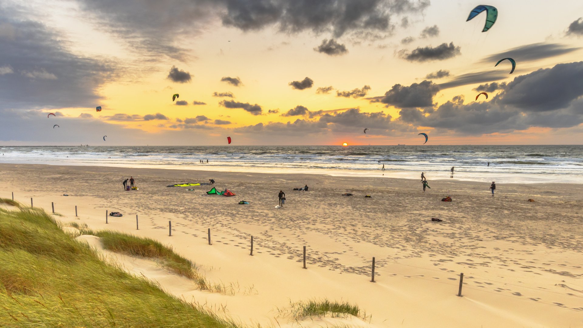 Zandvoort Aan Zee Kitesurfing seen from dunes at Sunset