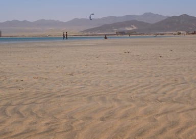 Sandy Beach in Lahami with Mountains in the Background