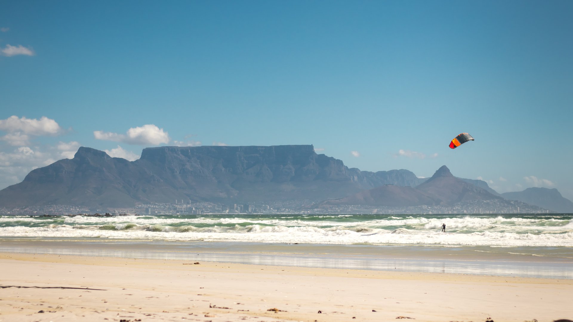 Big Bay Beach Views to Table Top mountain with single kiter in the water