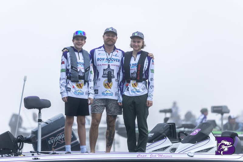 Captain Jed Mazour at a Boerne Bass Club 2026 season tournament with sponsor banners