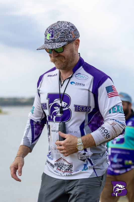 Boerne Bass Club angler holding largemouth bass at FAN tournament weigh-in, Texas Hill Country bass fishing