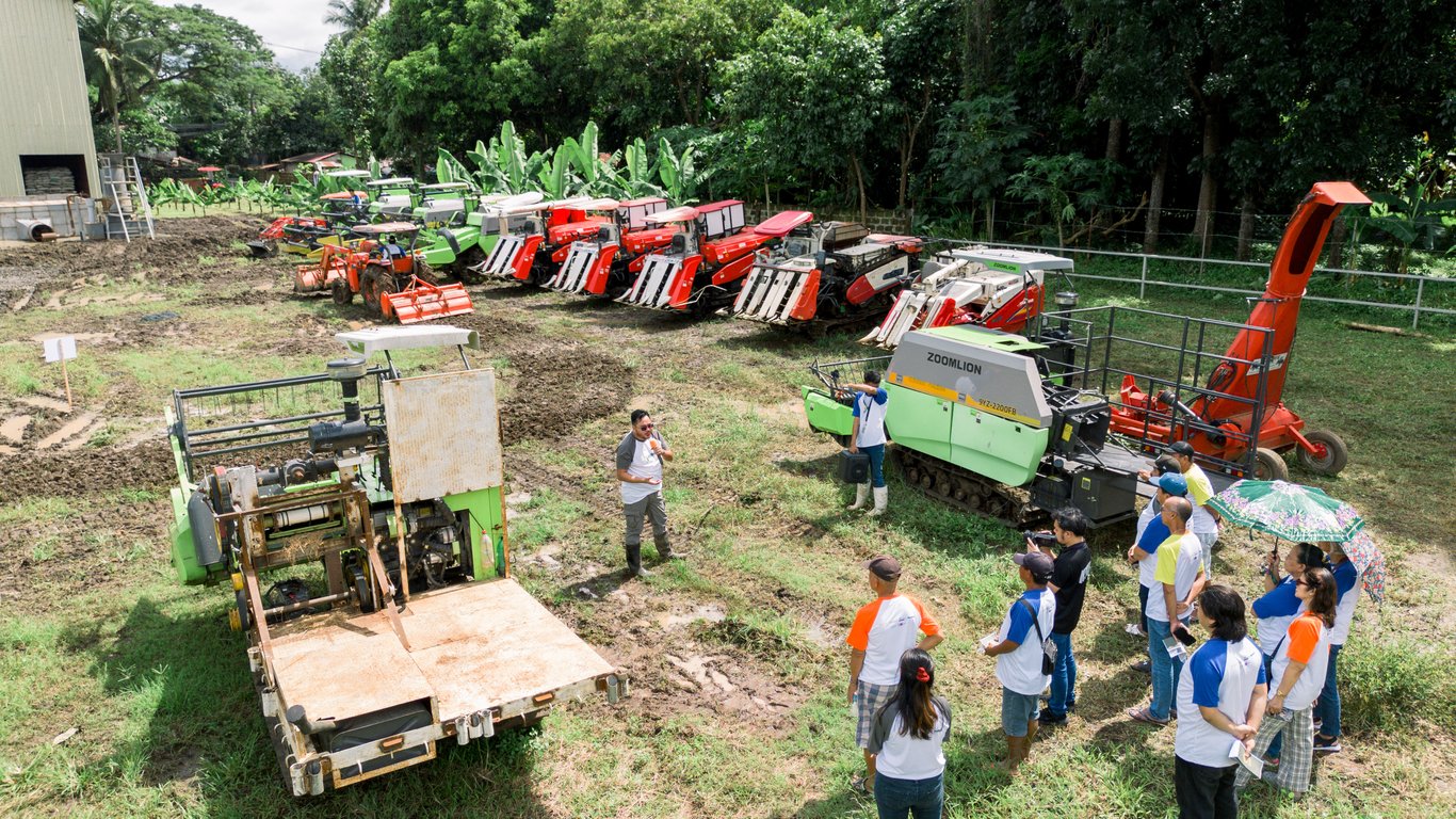 Farmers take part in the demo tour of the suite of agri-machineries, featuring technologies designed to improve efficiency, reduce costs, and promote sustainable rice farming practices.