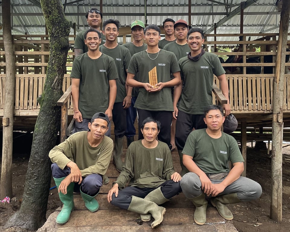 Celebrating our achievement as the Sustainable Brand of the Year 2024 at The Punch Sustainability Awards, our dedicated team at Treelogy proudly holds our award plaque, showcasing our commitment to leading Indonesia in sustainability and innovation.
