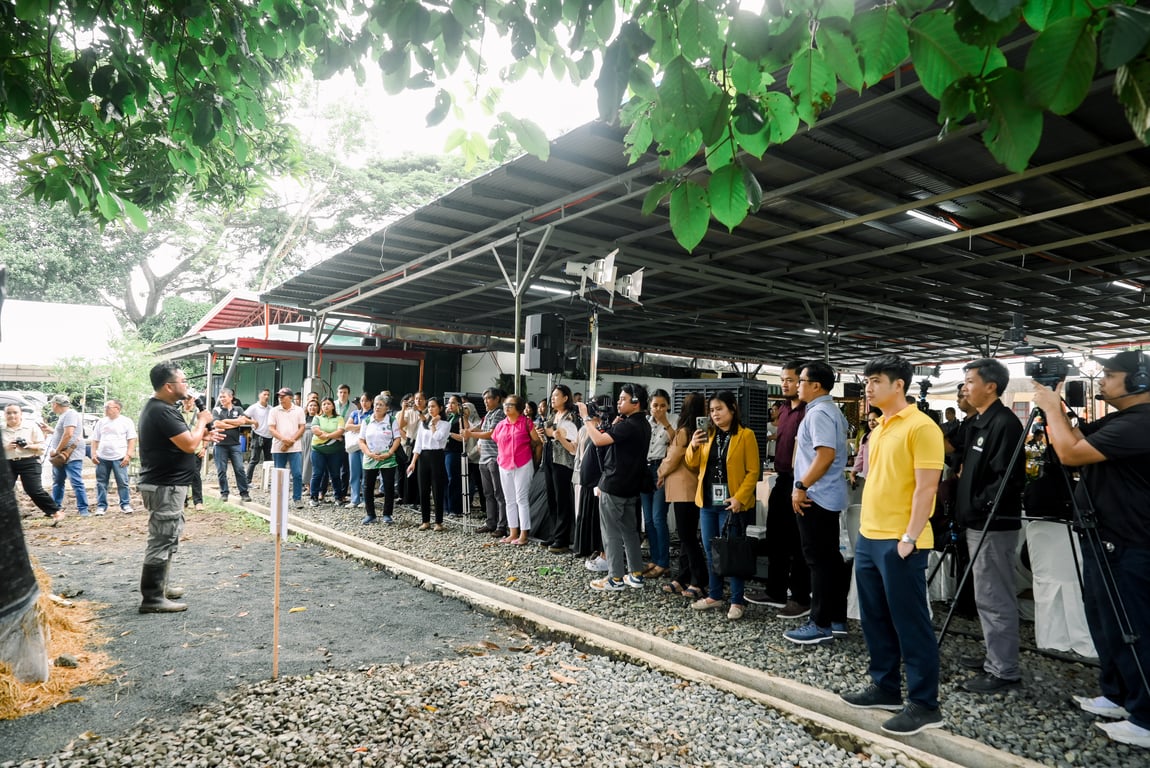Participants observe the mushroom production station during the grand launch of the Rice Straw Bioenergy Hub (RSBH) in Pila, Laguna, showcasing rice straw as a sustainable substrate for mushroom cultivation.