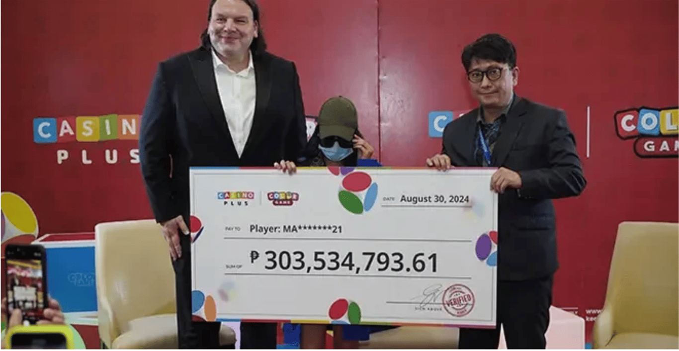Casino Plus&nbsp;CEO Evan Spytma (left) and Clark Development Corporation Assistant Vice President for Business Enhancement Rodem R. Perez (right) turn over the ₱303,534,793.61 Color Game jackpot on August 30, 2024.