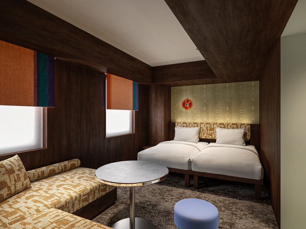 A 30-square-meter space based on the concept of a studio, this room is centered around the living area.
