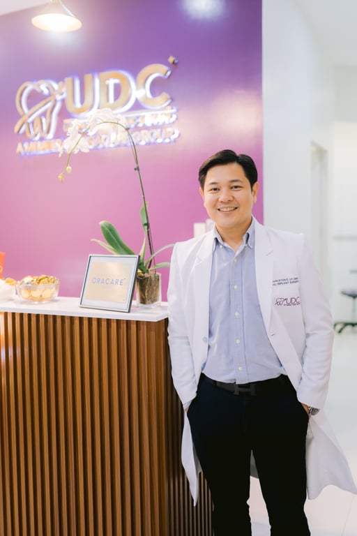 Dr. Charlston Uy, a dental specialist in implantology who has accomplished dental studies at Harvard University and Frankfurt Germany.