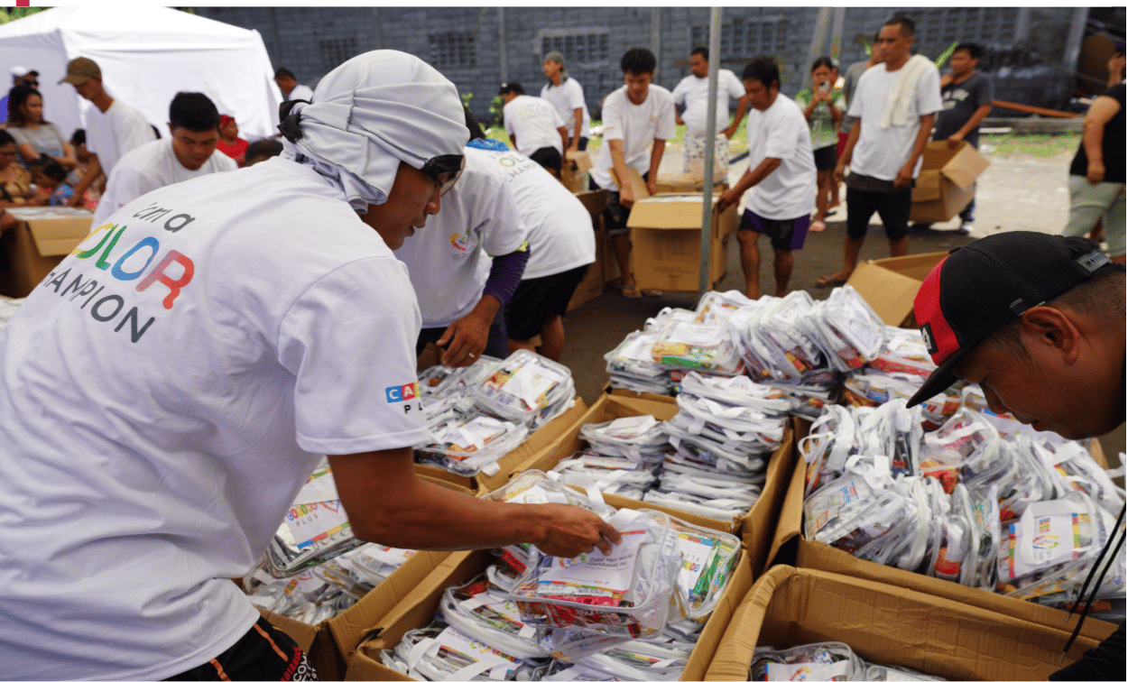 Volunteers from the community help the Color Your World Foundation to prepare the ‘makulay’ health kits on June 14, 2026.