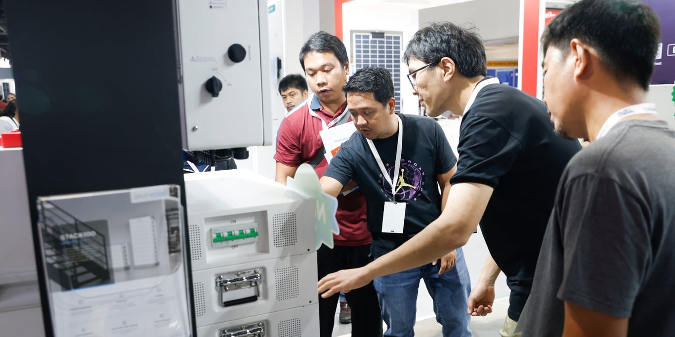 Attendees engaging with solar and energy storage technologies on the exhibition floor at Solar & Storage Live Philippines.
