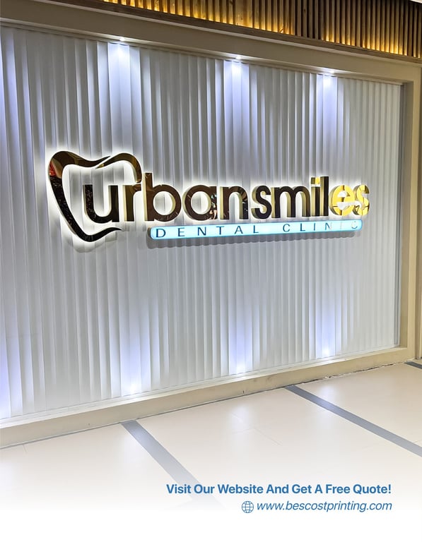 A sleek and modern signage installation for Urban Smiles Dental Clinic, combining gold mirror acrylic and soft backlighting to reflect trust and sophistication.