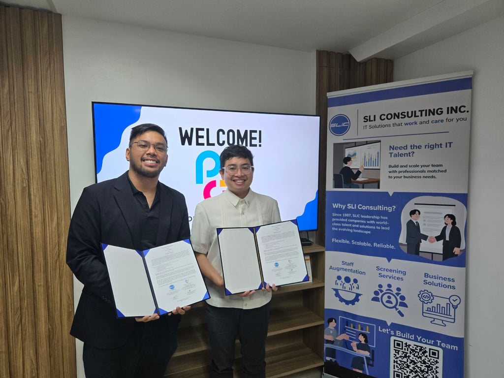 SLI Consulting Inc. and Philippine Coding Camp representatives come together to mark their partnership focused on education, continuous learning, and developing Filipino tech talent.