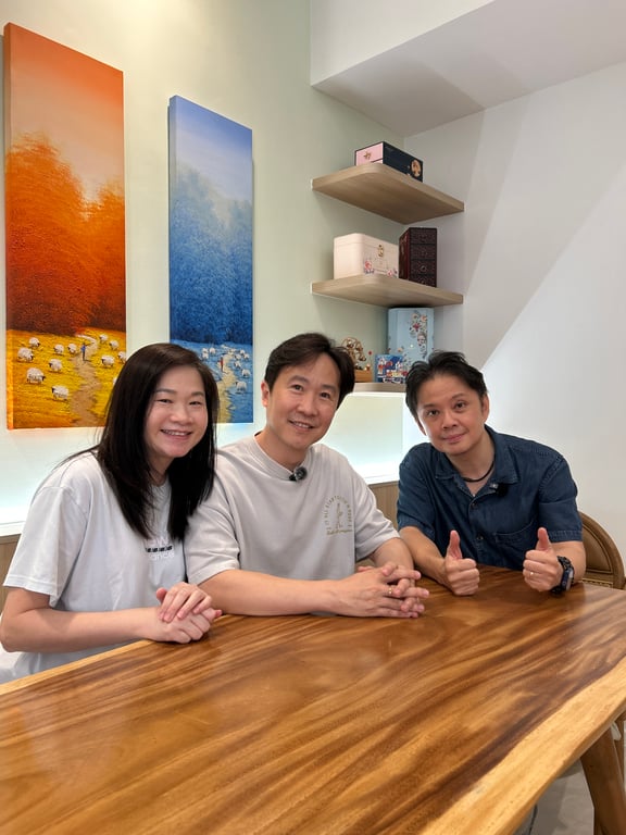 Creative Director Steven Loh (far right) with satisfied homeowners