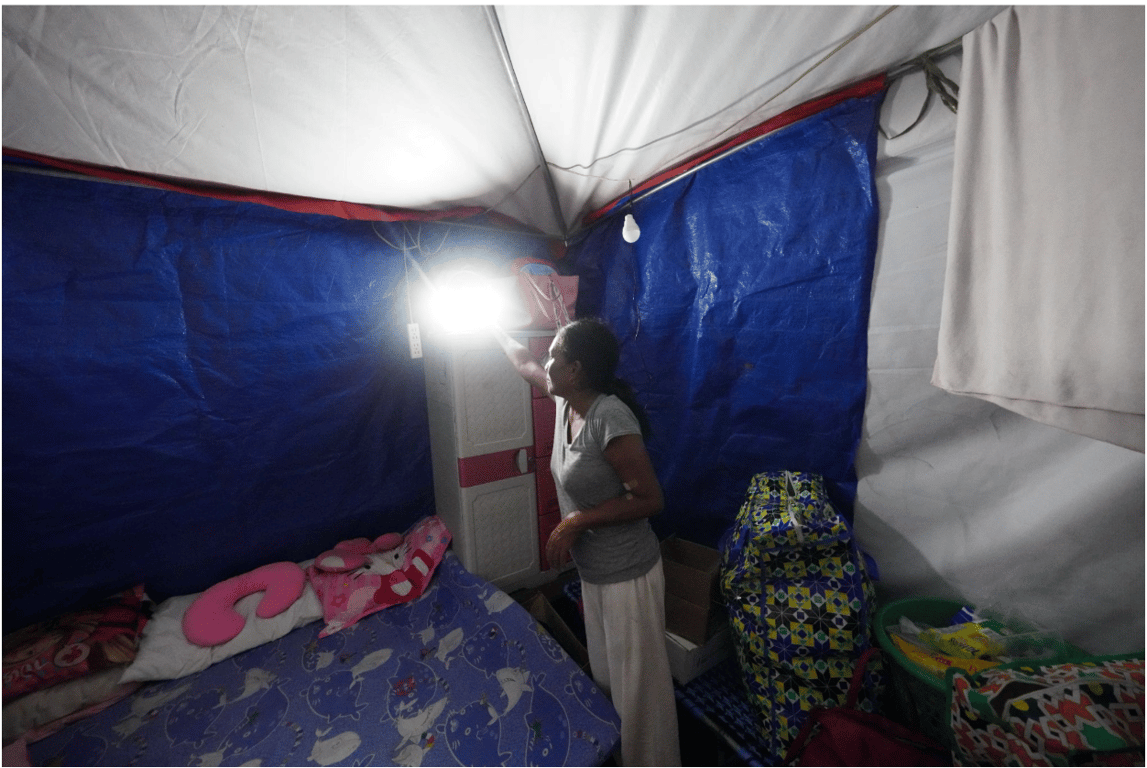 One of the beneficiaries of Color Your World Foundation’s solar-powered light and tent in Purok 20, Barangay Lagao, General Santos City on June 14, 2026. 