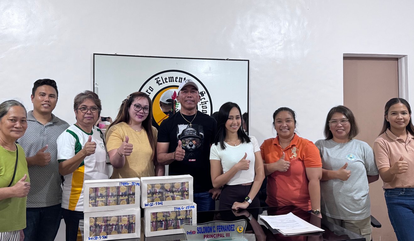 Mary Joy Olmstead during the turnover of 250 gold medals.