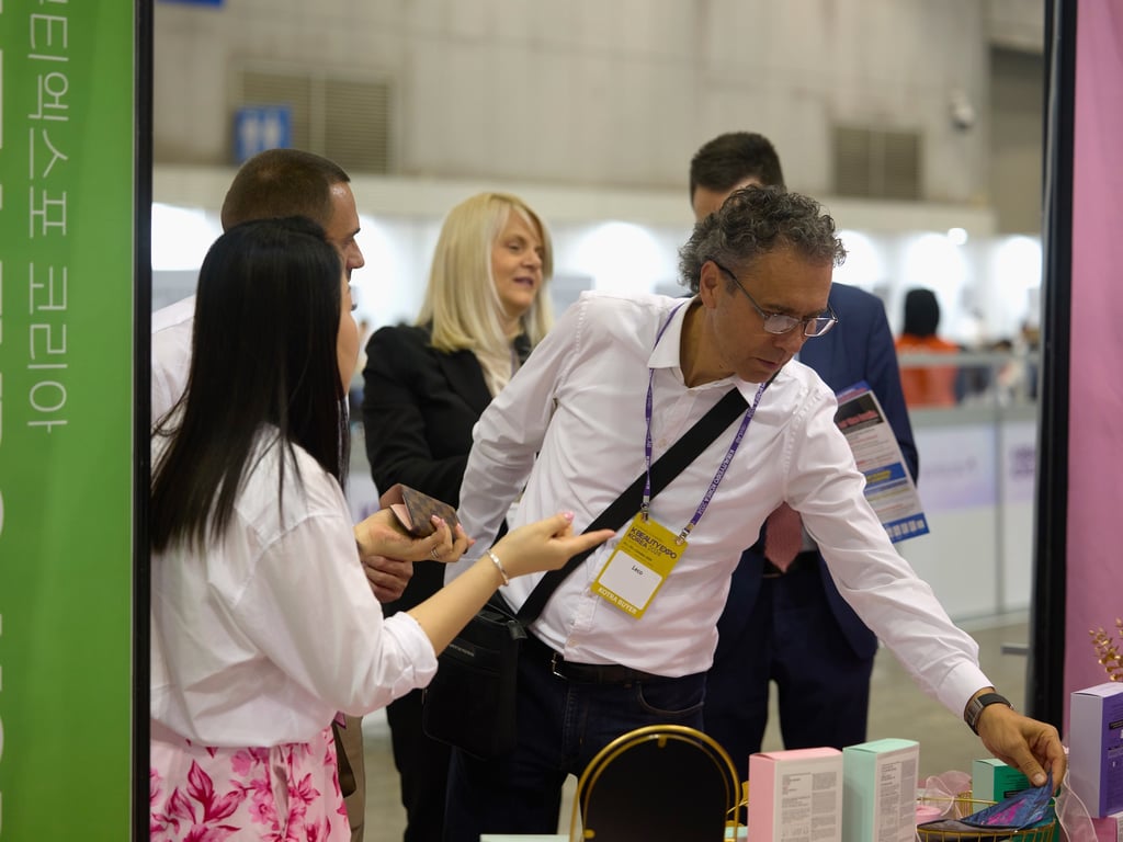 Interpreters played a crucial role in previous expos, helping Korean companies engage effectively with global buyers and close business opportunities. Photo courtesy of KBeautyExpo. 