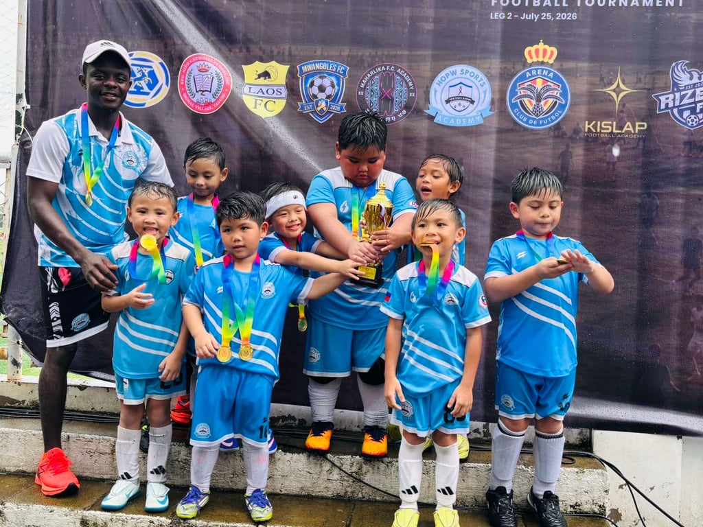 Under-6 champions celebrate their title victory