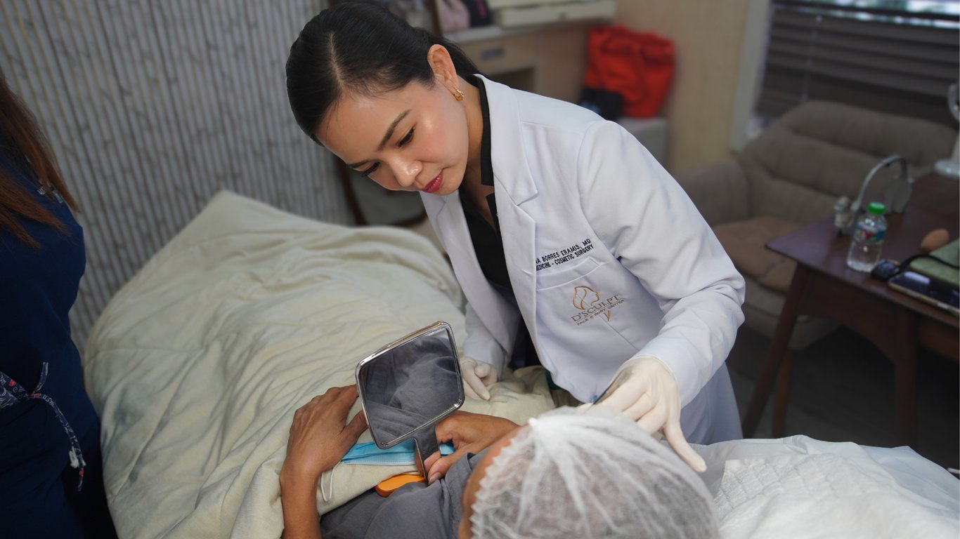 Dr. Donna checks on the patient after the surgery, emphasizing the importance of postoperative care and monitoring.